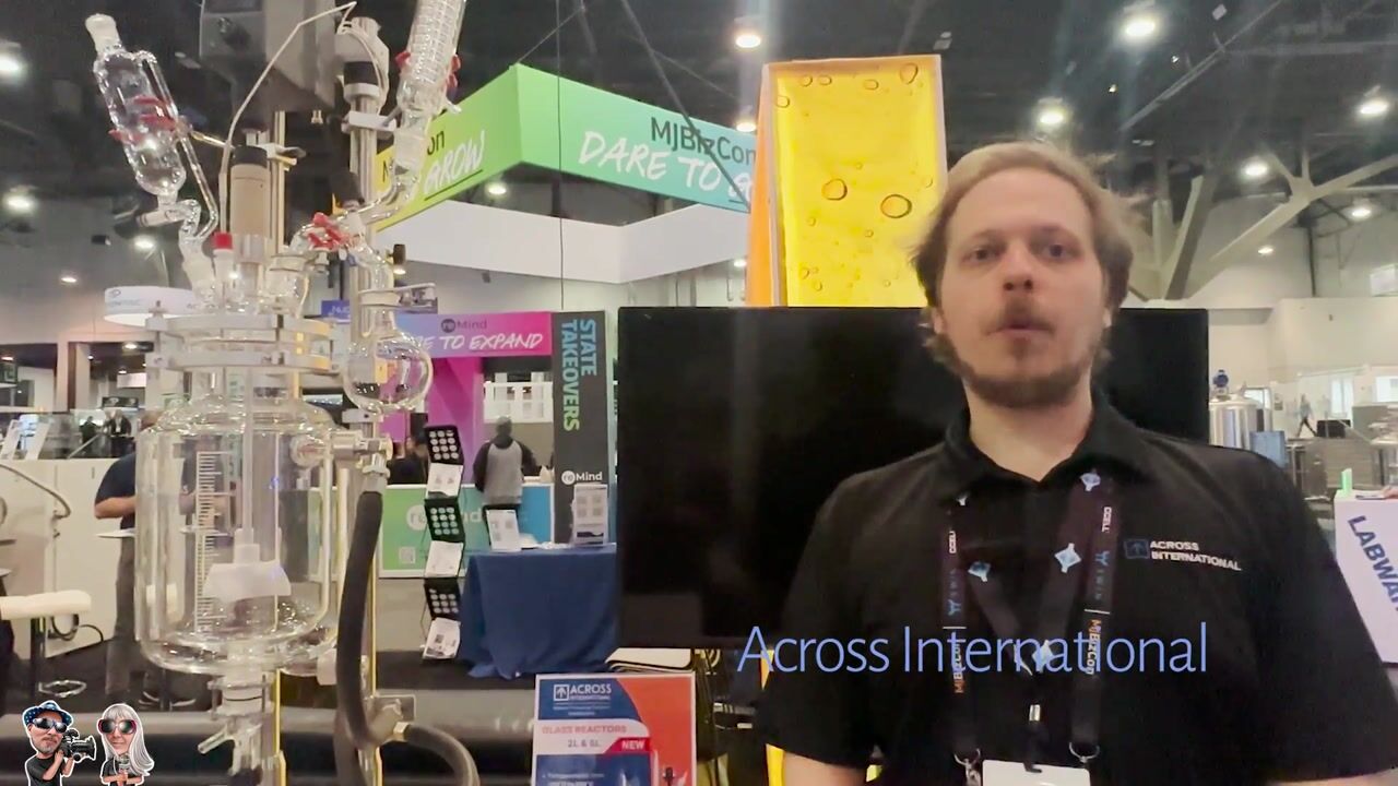 Maxwell from Across International at MJBizCon showing off their New Glass Reactor