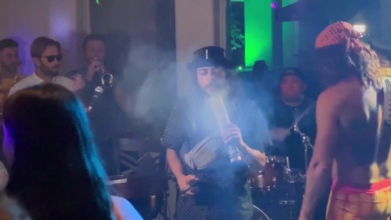 Fortunate Youth smoke break at the Lucid Psychedelics party